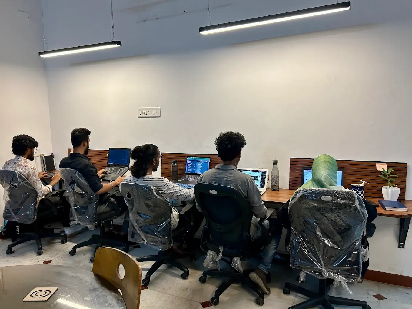 ShipHit dedicated team managing courier operations at their workstations