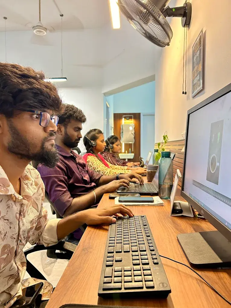 ShipHit logistics team focused at their workstations managing global shipments